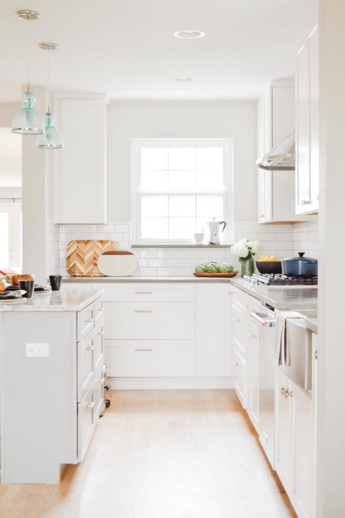 white kitchen cabinets and grey quartz countertops