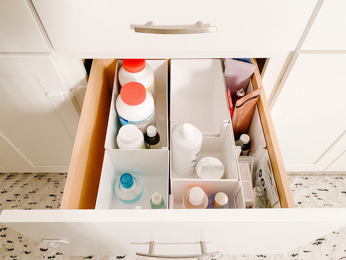 middle bathroom drawer with organizer bins