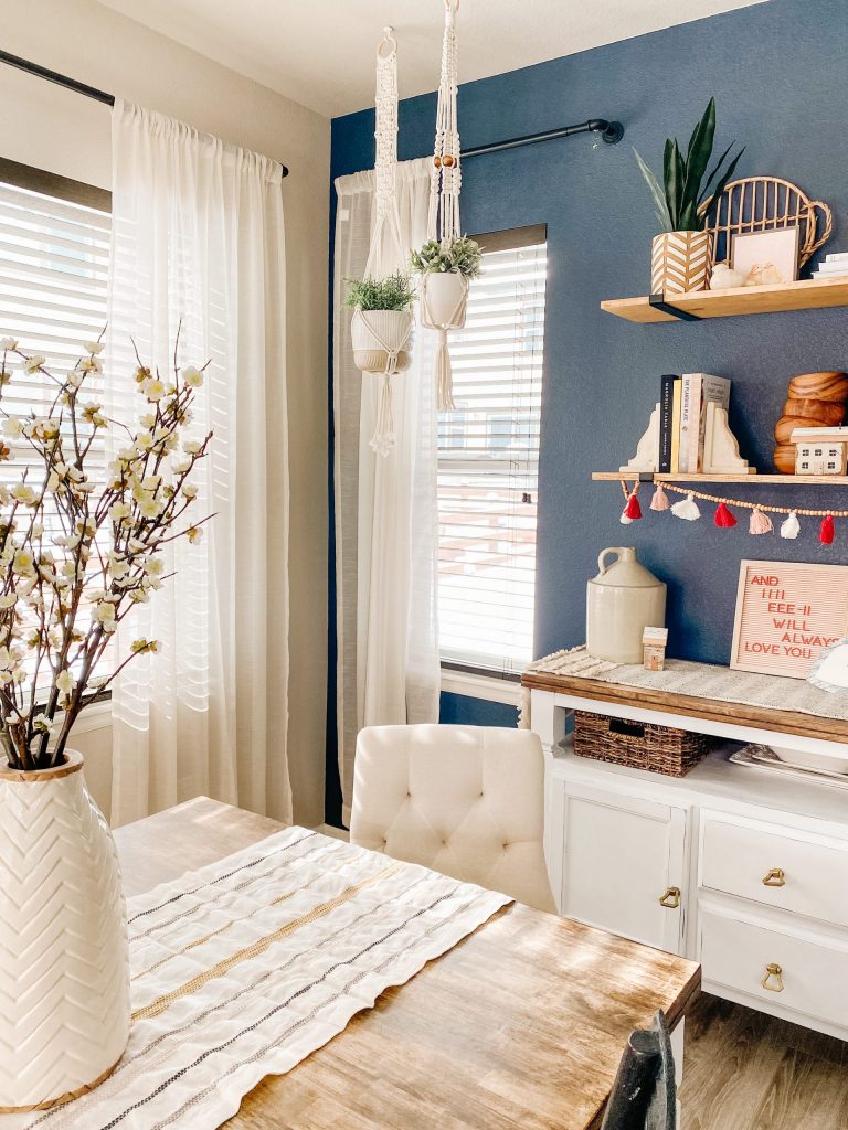 diy macrame plant hangers with navy wall and wood shelves and white vase