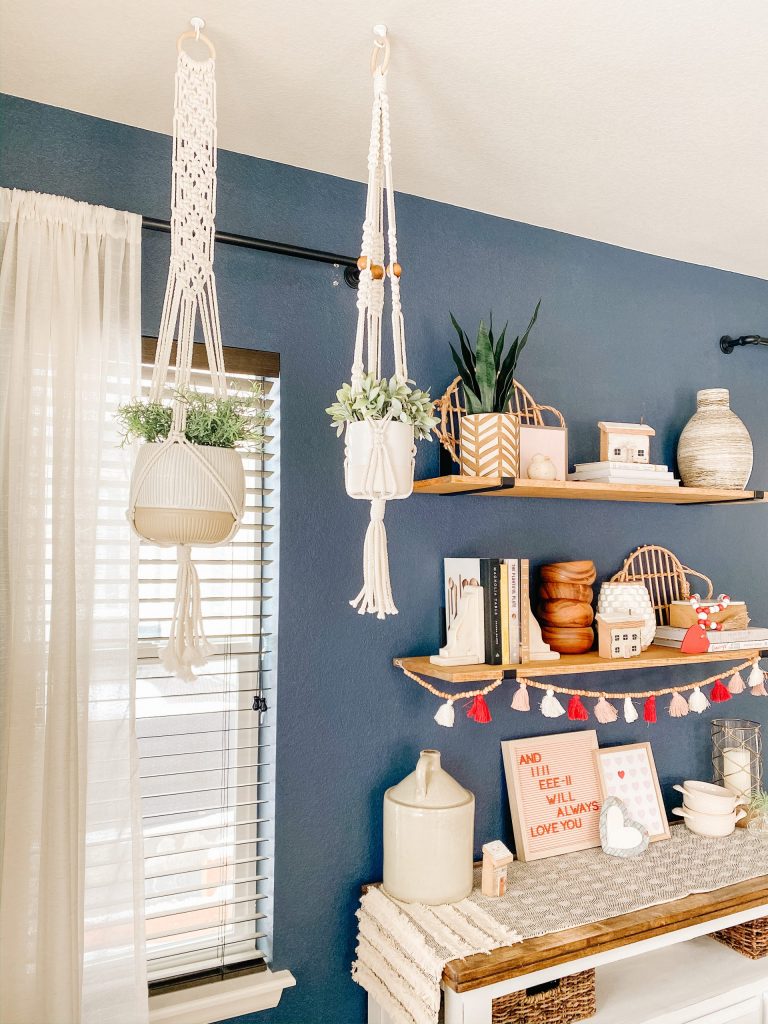 diy macrame plant hangers with navy wall and wood shelves