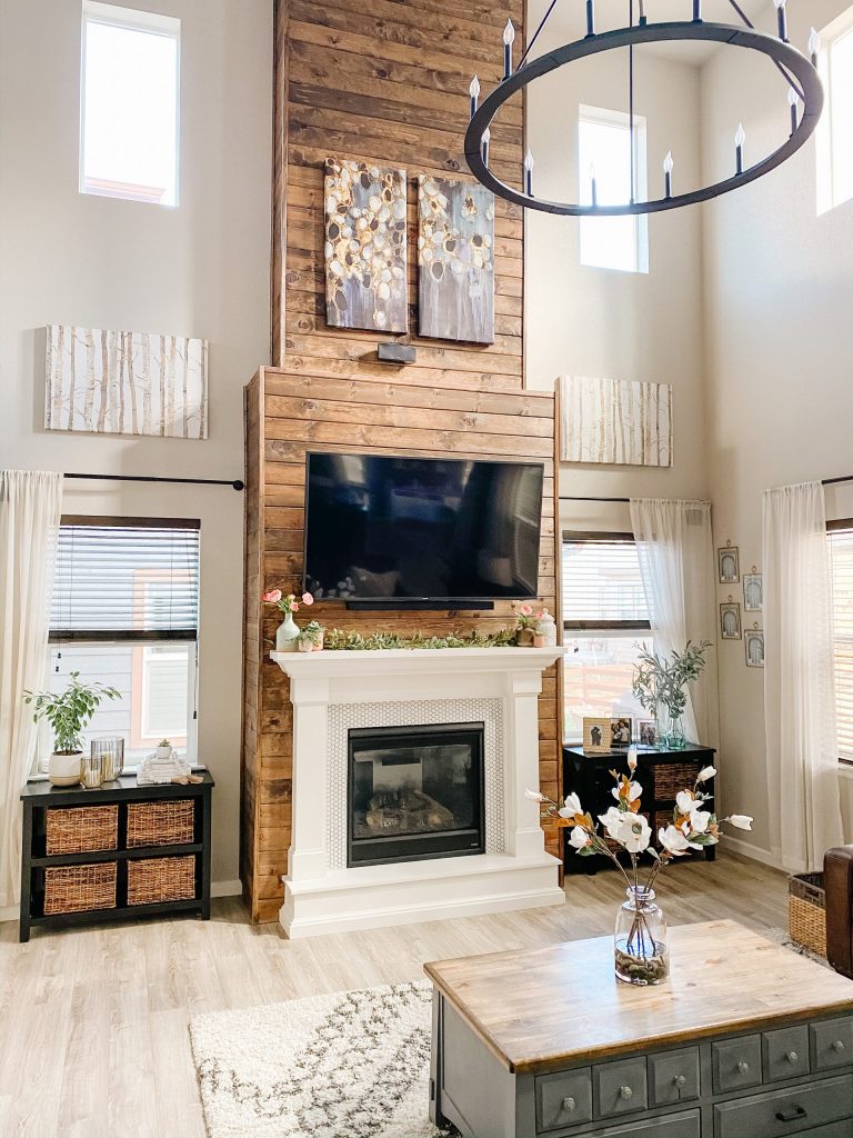 living room fireplace wall design with stained wood shiplap