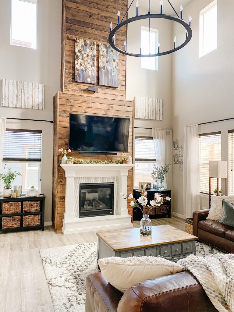 living room fireplace wall design with stained wood shiplap