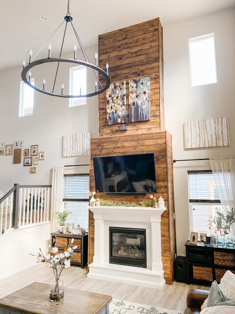 living room fireplace wall design with stained wood shiplap