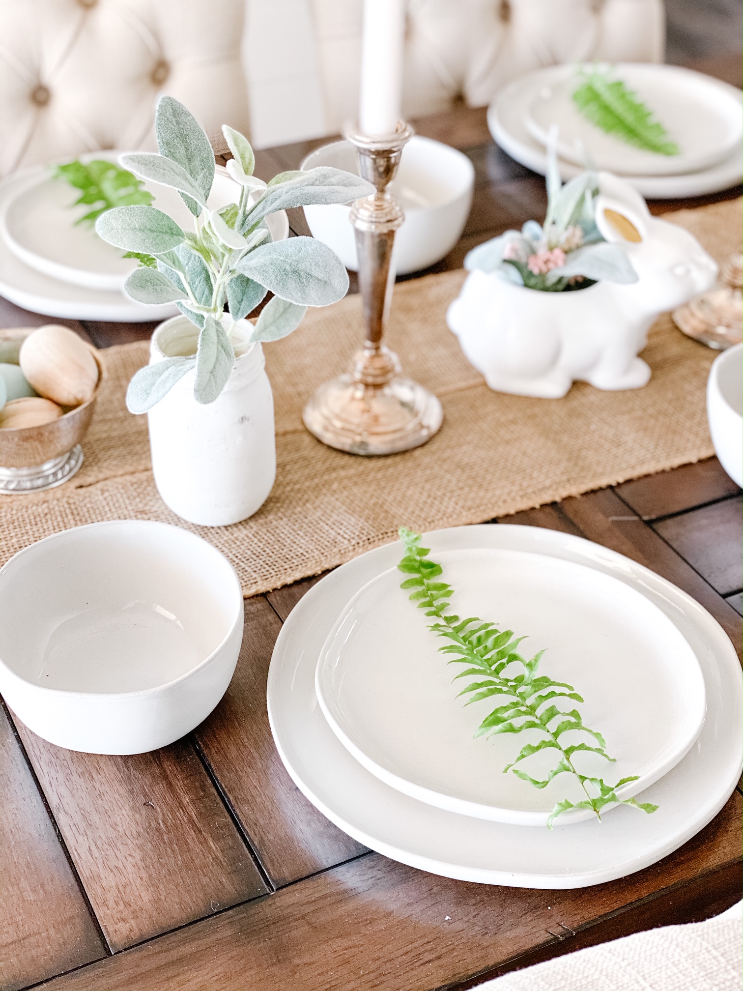 tableware on a dining table with easter decorations