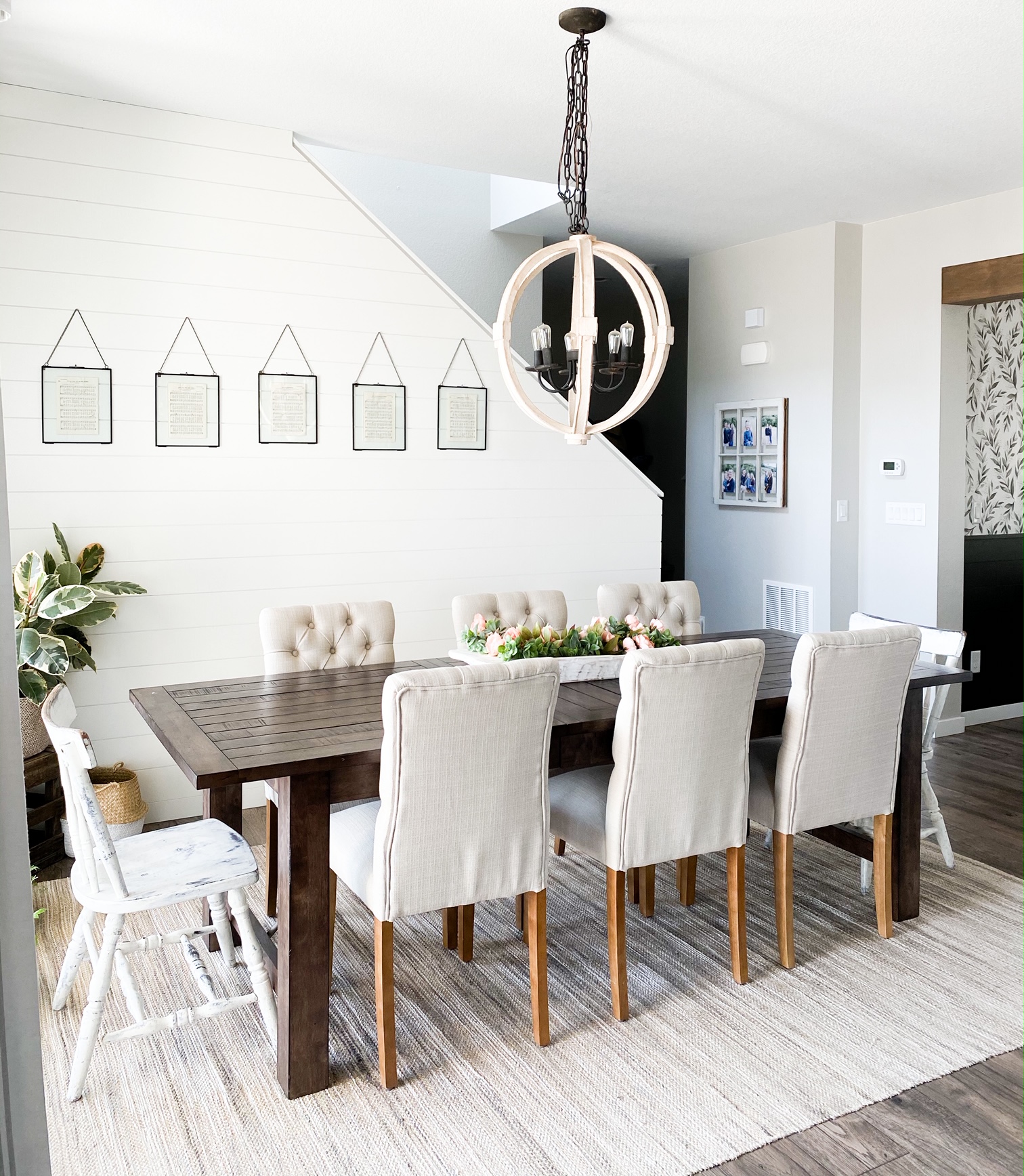 dining room with shiplap painted white