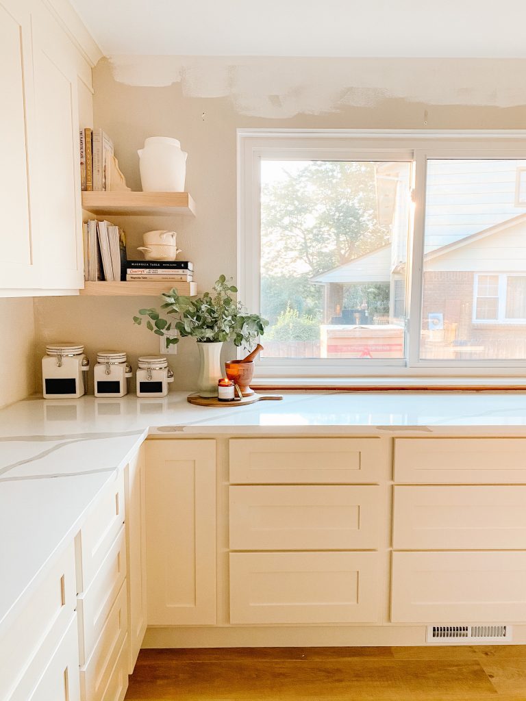 kitchen remodel with quartz counters and open shelving