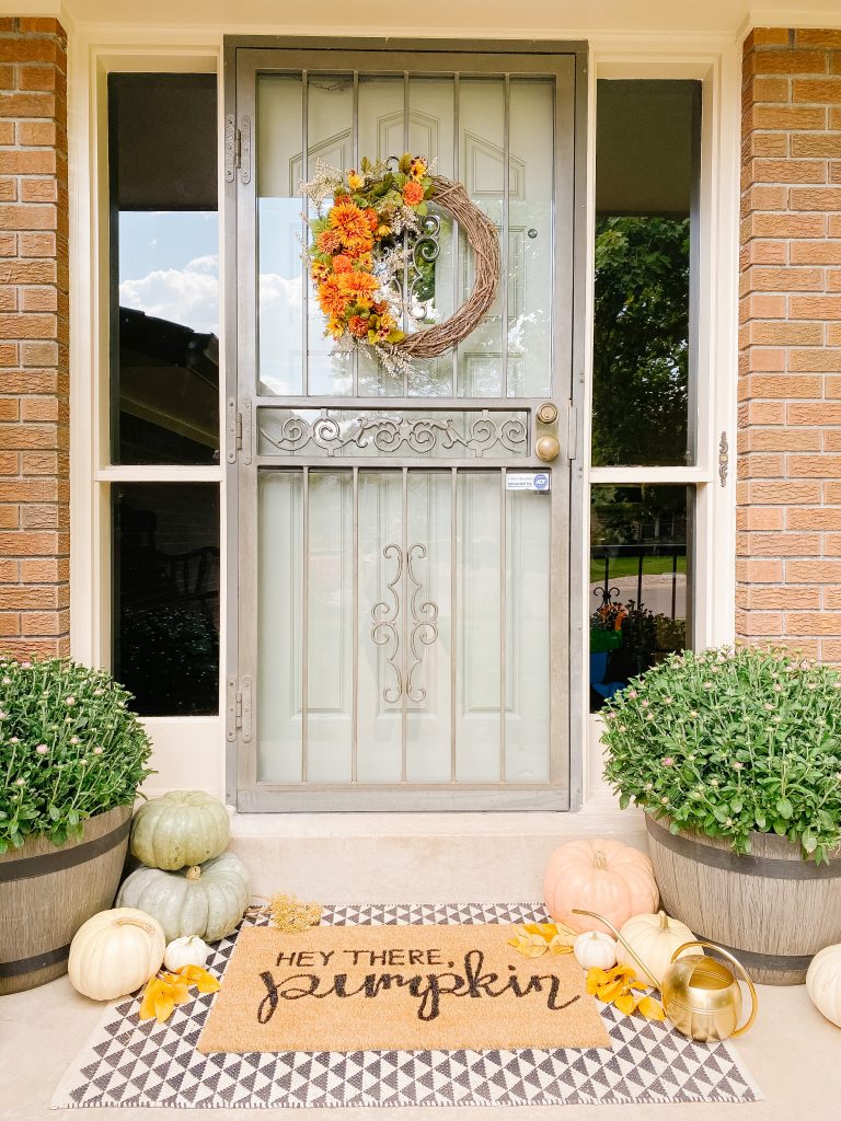 fall doormat with plaid underlay. Fall decor ideas for your porch.