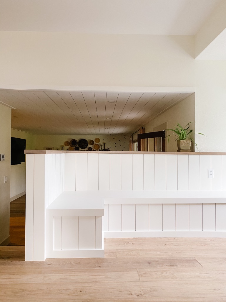 kitchen banquette bench with white shiplap