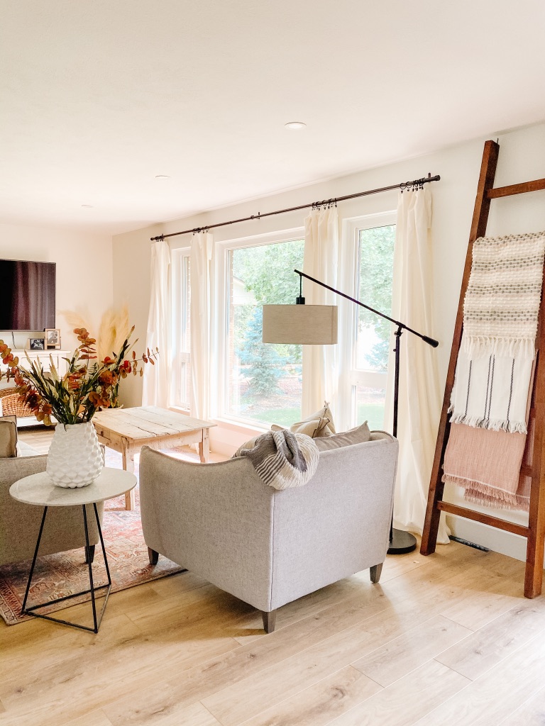 woodley's fine furniture seating set with neutral grey sofa and chair and boho area rug