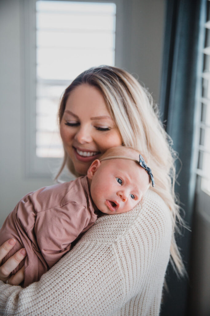 Make sure the baby is fed with a new diaper so that they are happy while your newborn photographer is there!