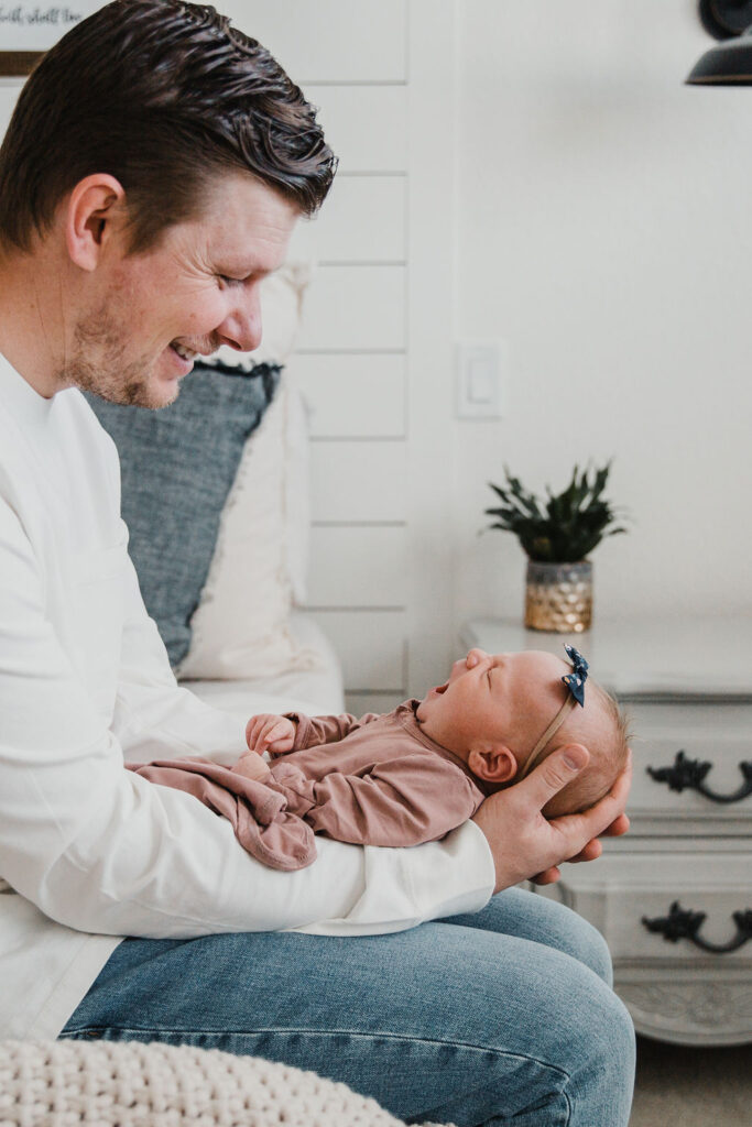 Make sure your nightstands are cleaned off and all cords are hidden so they they aren't in the background of your newborn photos.