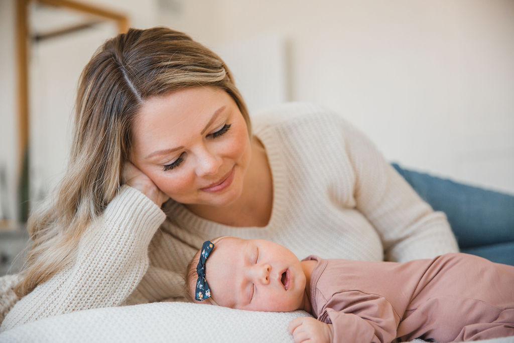 Another newborn photography tip is to wear clothing that is comfortable so you can lay and sit in different positions easily.