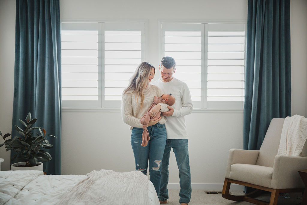 Newborn photography looks best when the room you're shooting in is clean and tidy with lots of natural light.