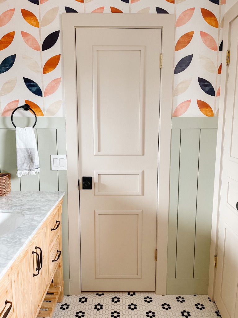 how to majorly update flat panel doors on a budget with wood moulding and paint