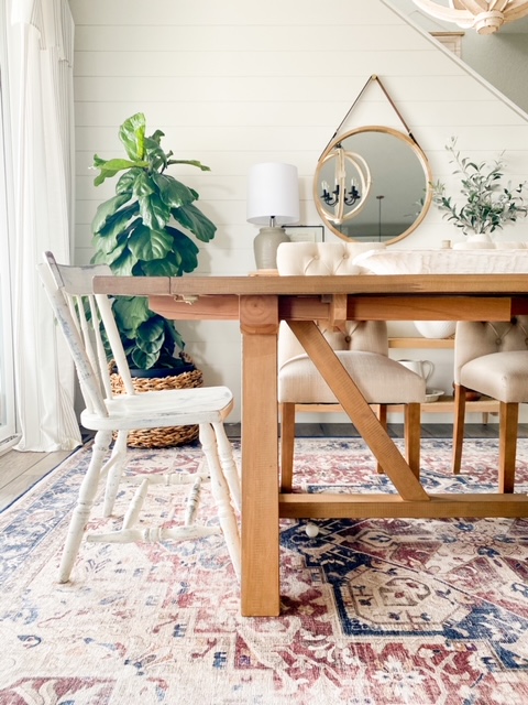 Close up of farmhouse dining table legs.