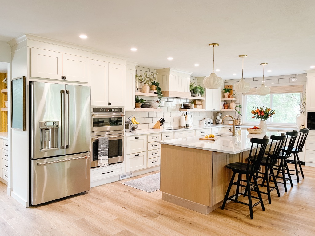 1970s kitchen remodel after with white oak lvp flooring and cream cabinets