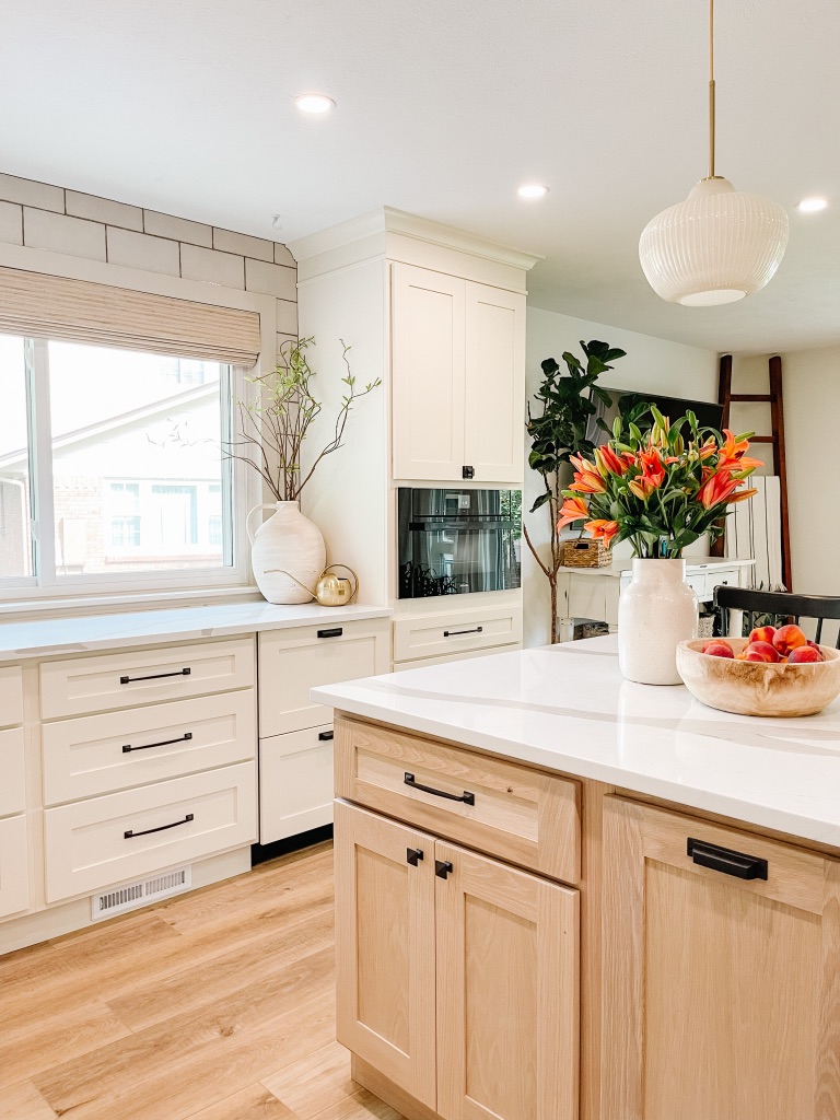 kitchen remodel with cream and white oak cabinets