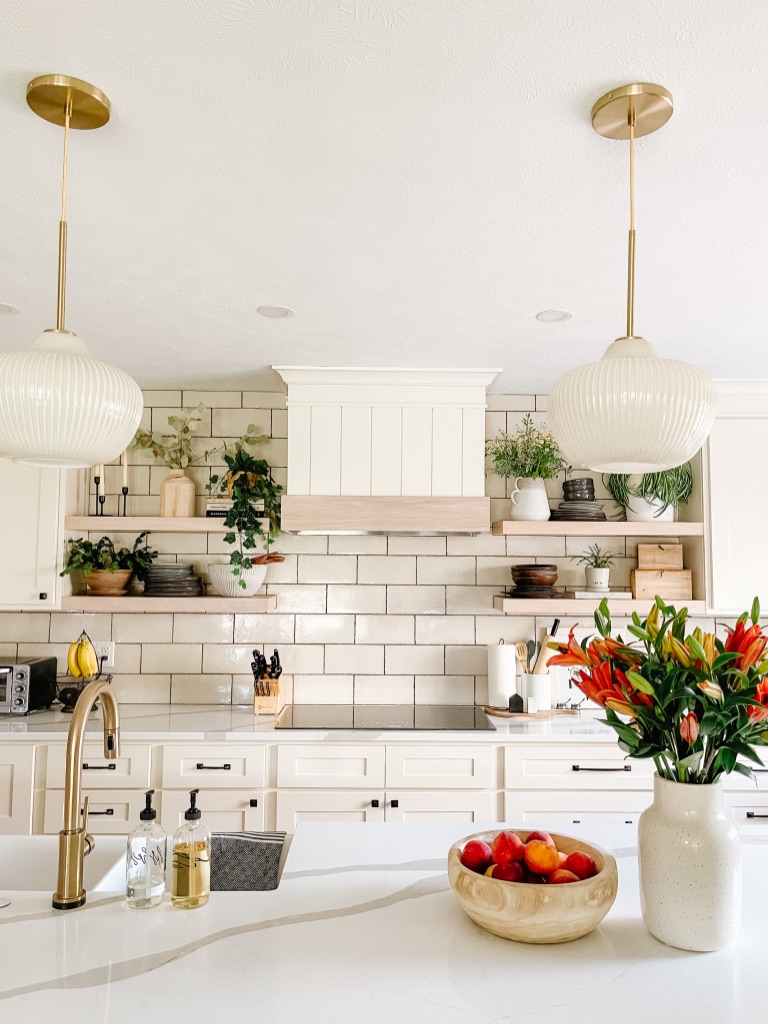 1970's kitchen remodel with custom hood cover and floating wood shelves