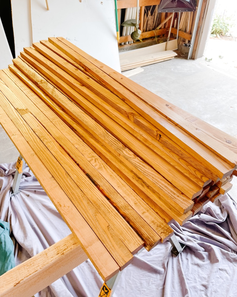 horizontal planks for wood slat trellis stained with Varathane Golden Oak Wood Stain