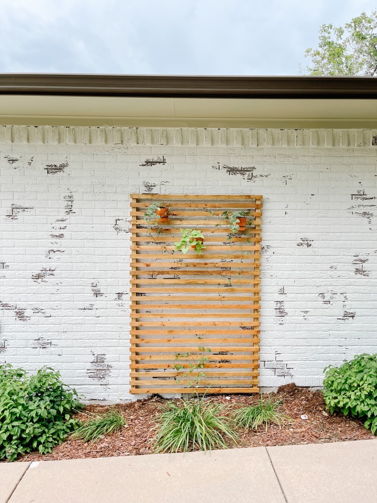 easy DIY wood trellis for a brick wall