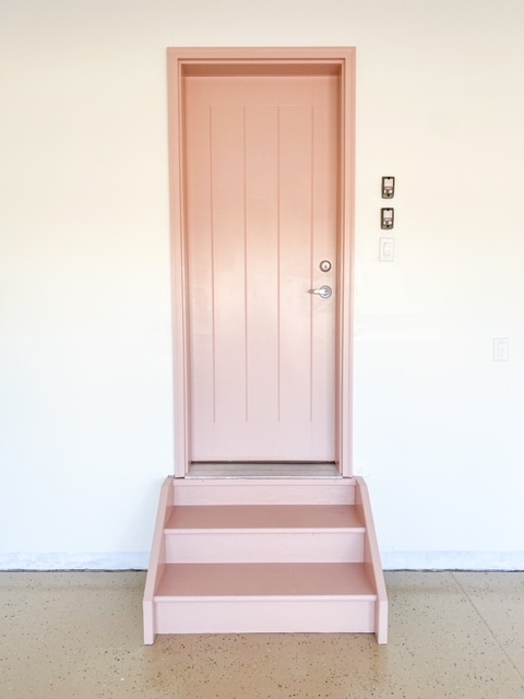 Art Deco Pink by Behr door in garage.