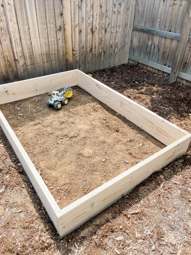 building the base of a large DIY sandbox