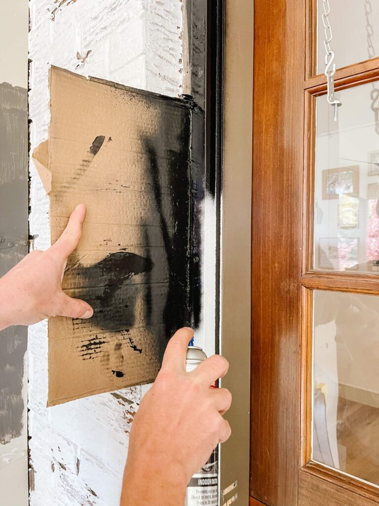 spray paint your old metal storm door