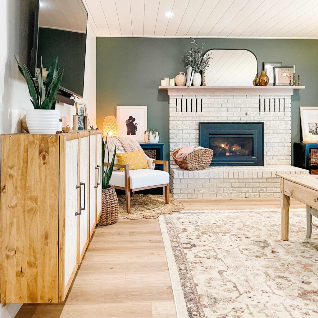Family Room with Green Accent Wall and Ikea Ivar TV Console