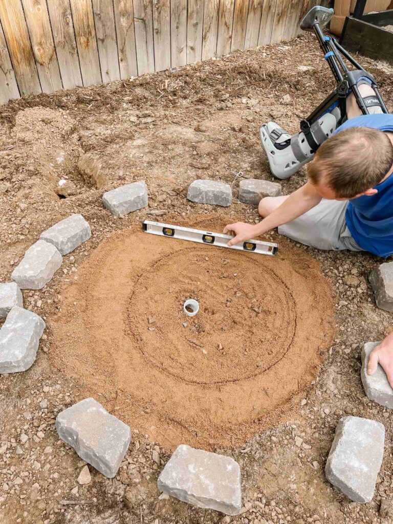 DIY Propane Fire Pit - level ground and first layer of stone