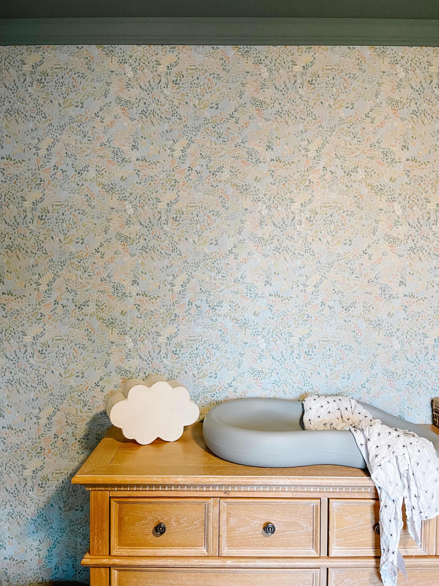 Colorful Boy Nursery with Wallpaper and Contrast Trim Sprucing Up