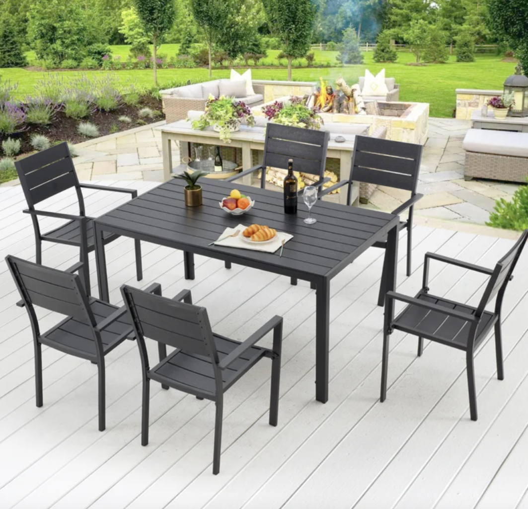 black metal outdoor dining table and matching chairs